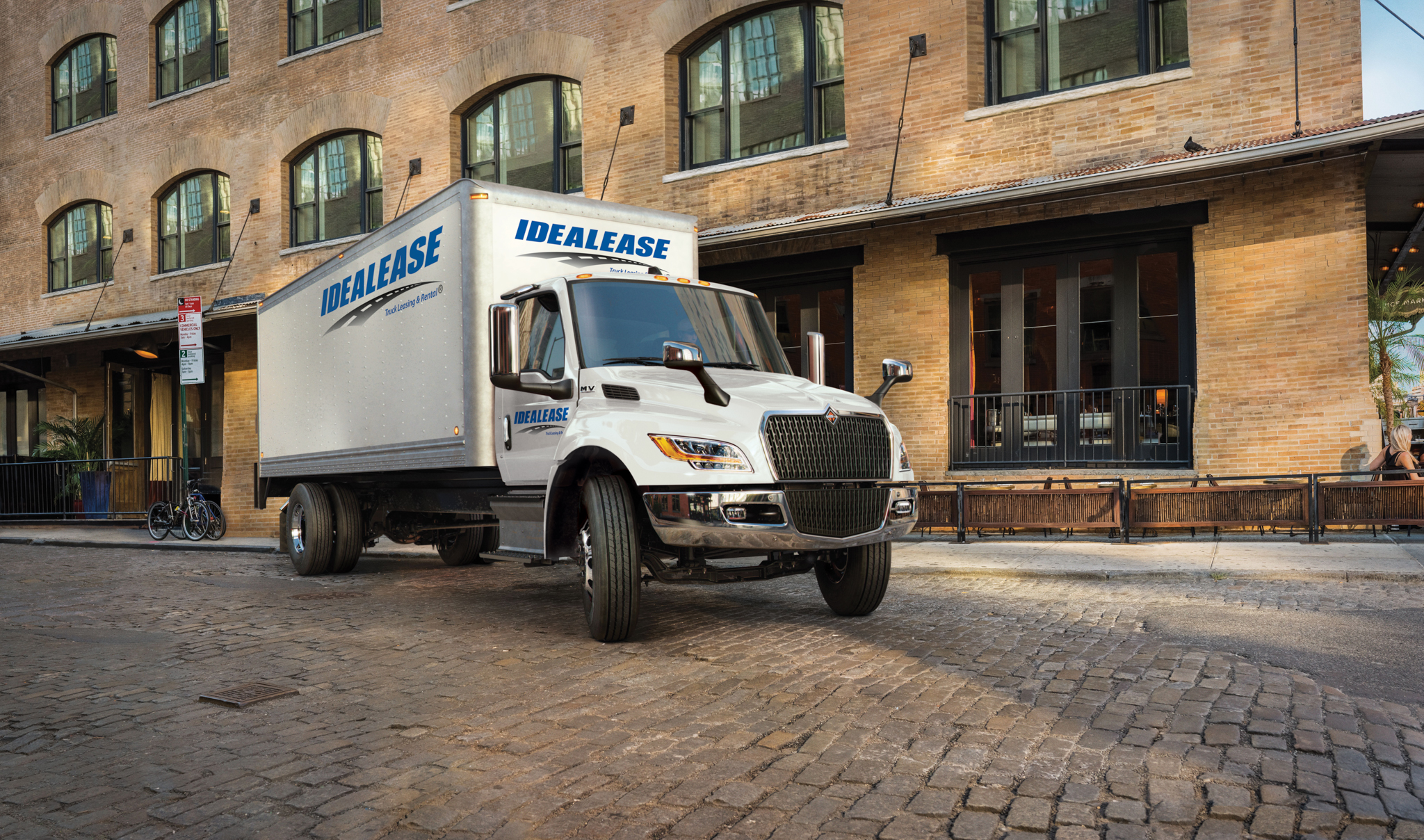 Idealease commercial box truck on the road